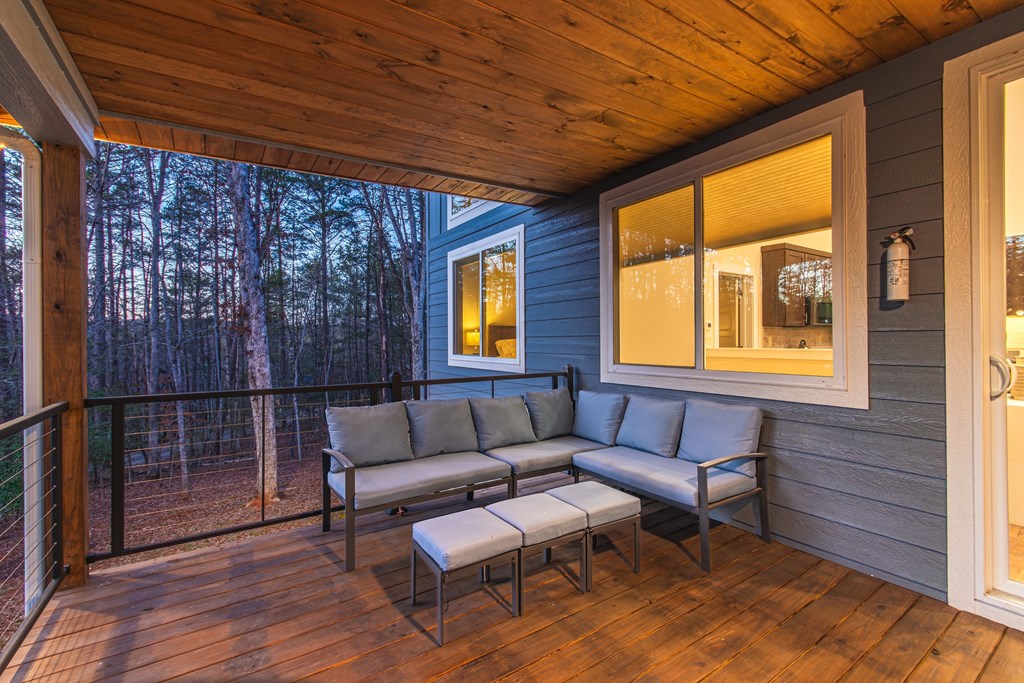 1001 Sunset Road Epworth, GA 30541 - Photo 20 of 34 a outdoor living space with furniture and a rug