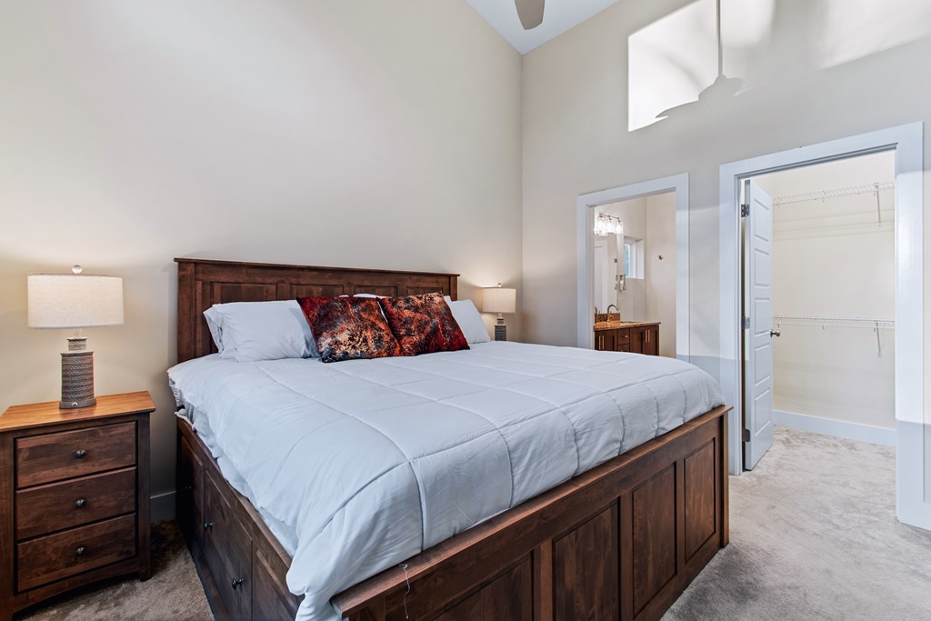 1001 Sunset Road Epworth, GA 30541 - Photo 24 of 34 a bedroom with a bed and a night stand