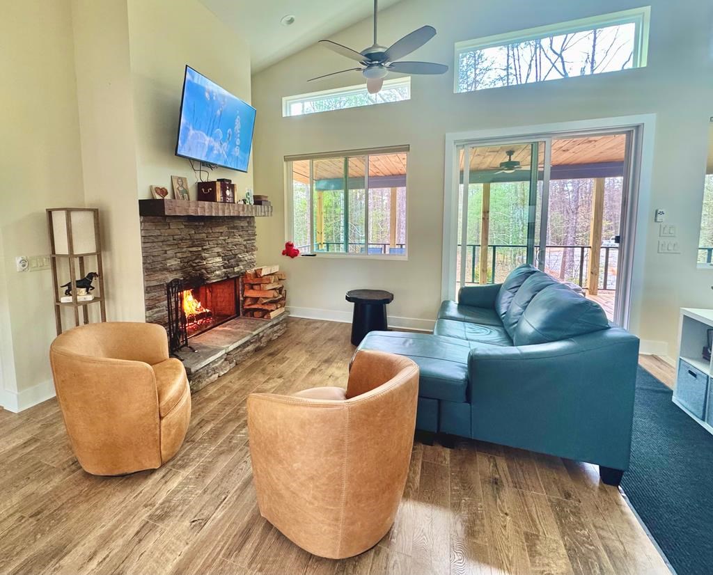 1001 Sunset Road Epworth, GA 30541 - Photo 3 of 34 a living room with furniture and a fireplace