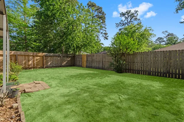 a view of a backyard with a garden