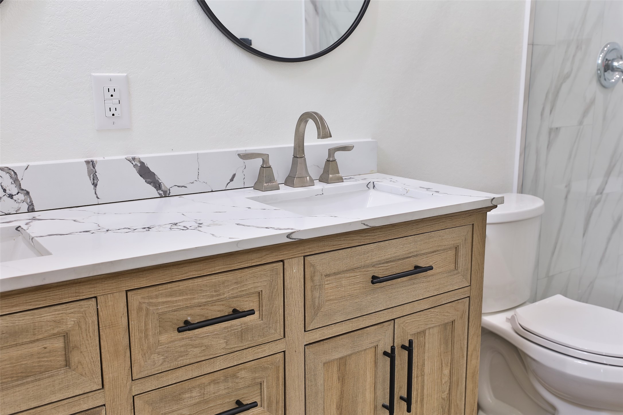 7924 Booker Street, Unit B Houston, TX 77028 - Photo 12 of 19 a bathroom with a sink and a mirror