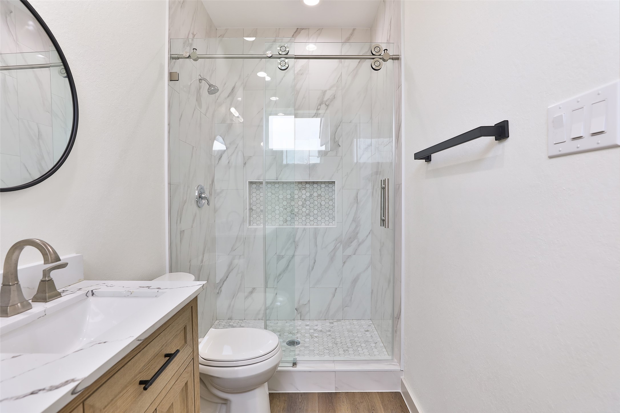7924 Booker Street, Unit B Houston, TX 77028 - Photo 13 of 19 a bathroom with a sink toilet and shower