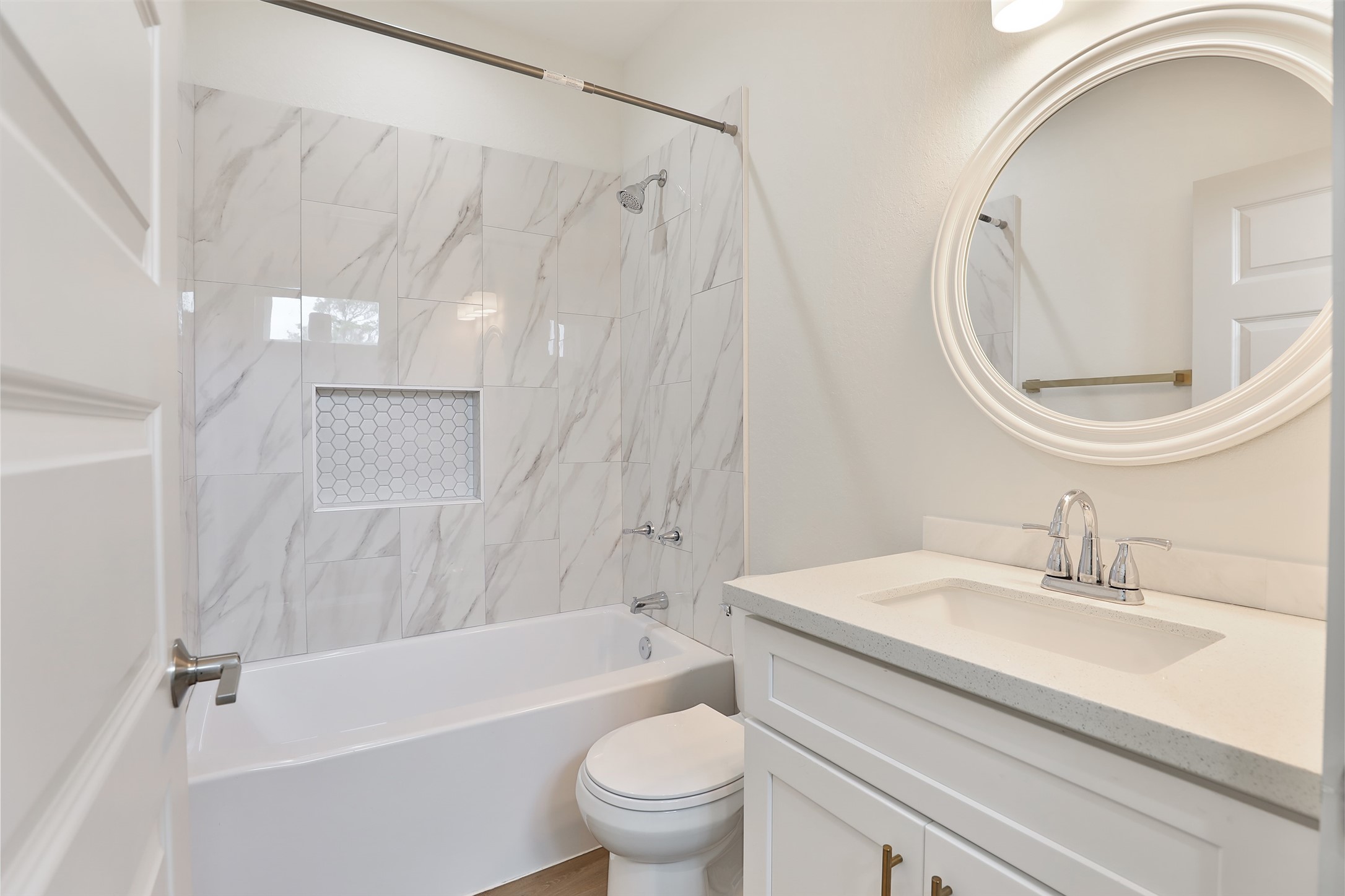 7924 Booker Street, Unit B Houston, TX 77028 - Photo 15 of 19 a bathroom with a sink a toilet and a mirror
