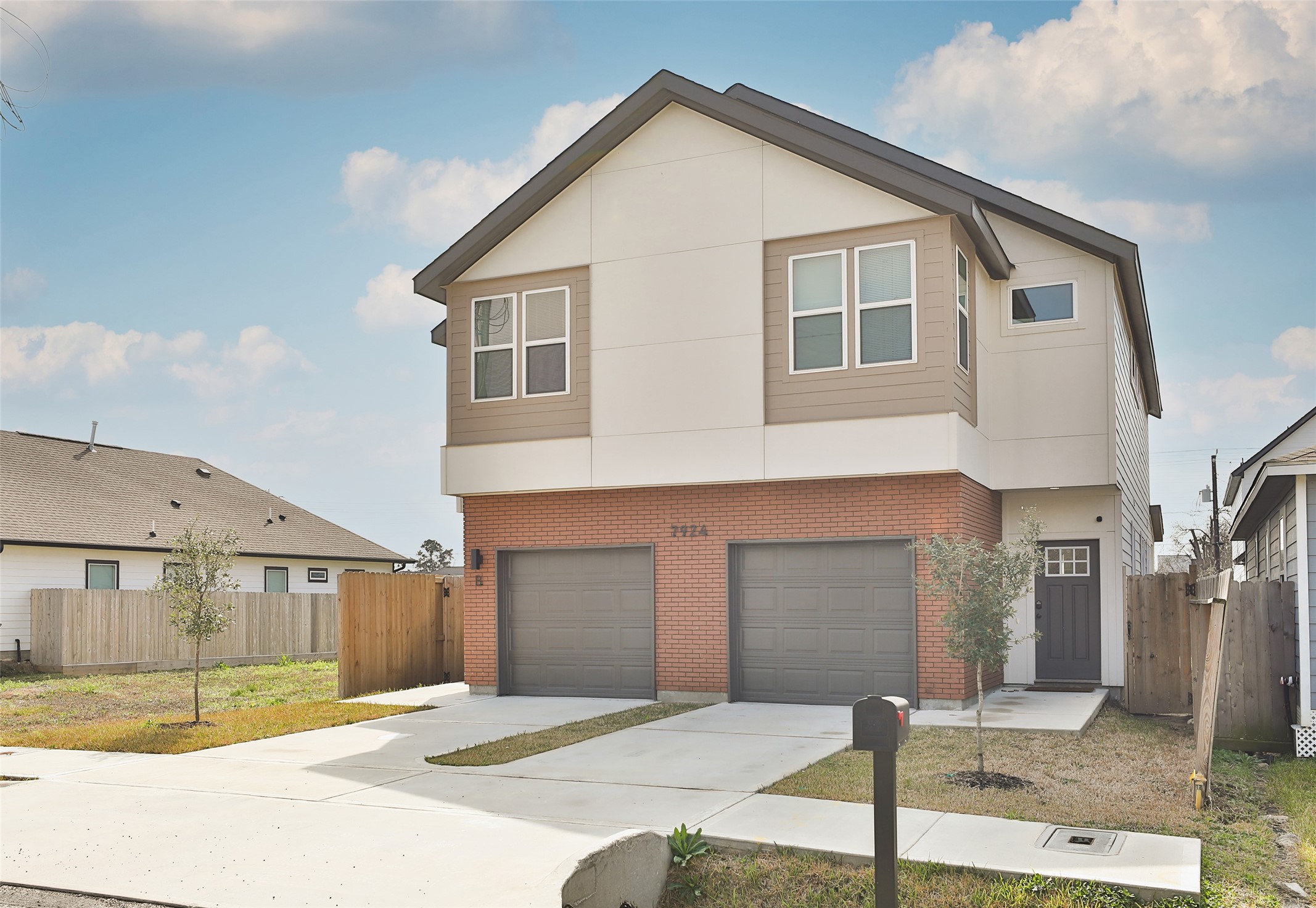 7924 Booker Street, Unit B Houston, TX 77028 - Photo 2 of 19 a front view of a house with a garage