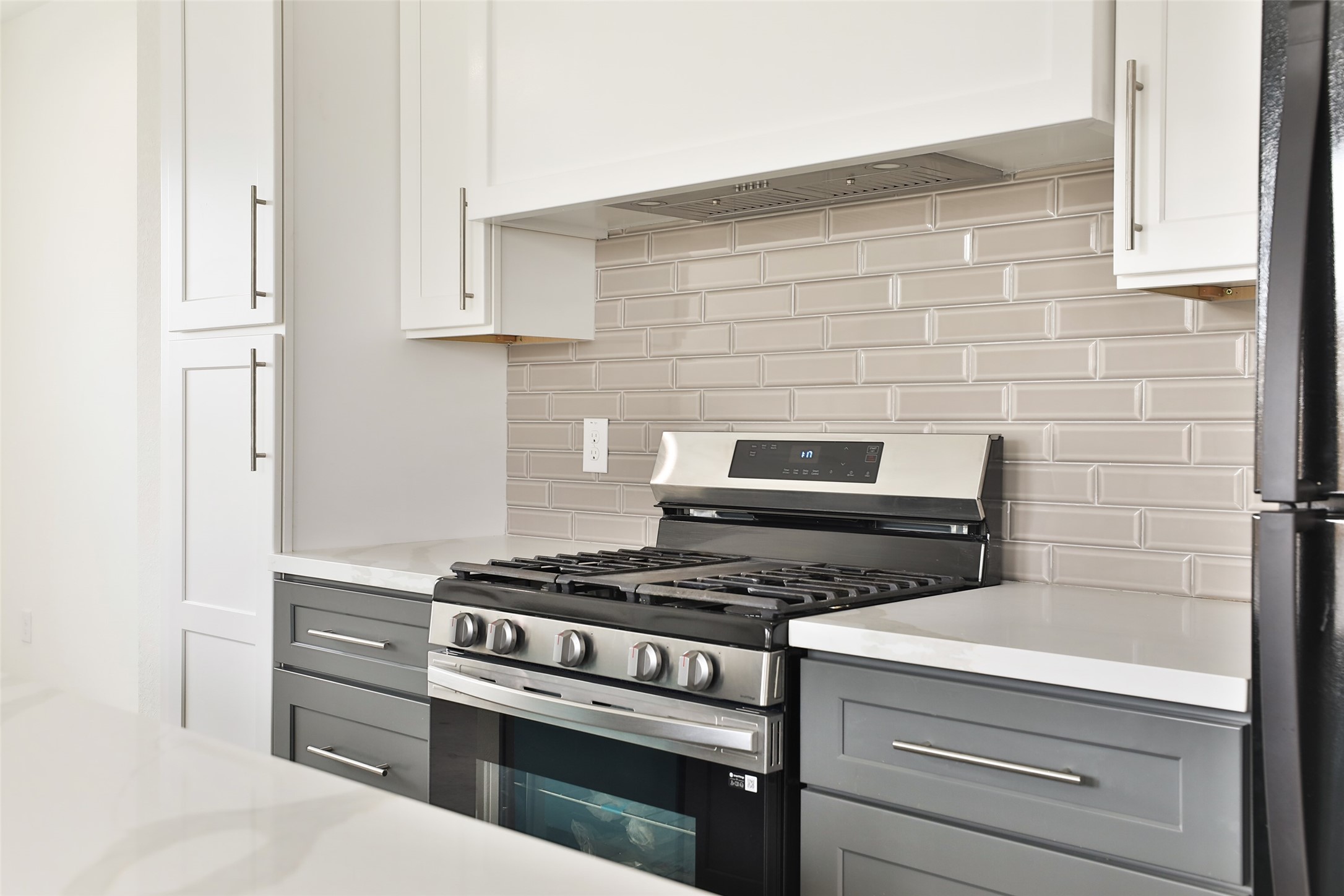 7924 Booker Street, Unit B Houston, TX 77028 - Photo 8 of 19 a stove top oven sitting inside of a kitchen