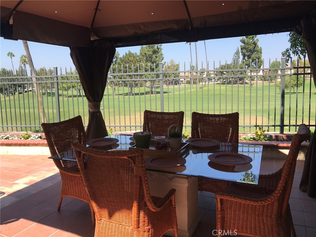 12823 Maxwell Drive Tustin, CA 92782 - Photo 16 of 25 a view of a patio with furniture