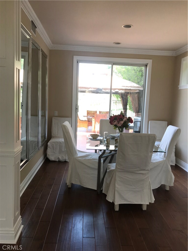 12823 Maxwell Drive Tustin, CA 92782 - Photo 19 of 25 a living room with furniture and a large window