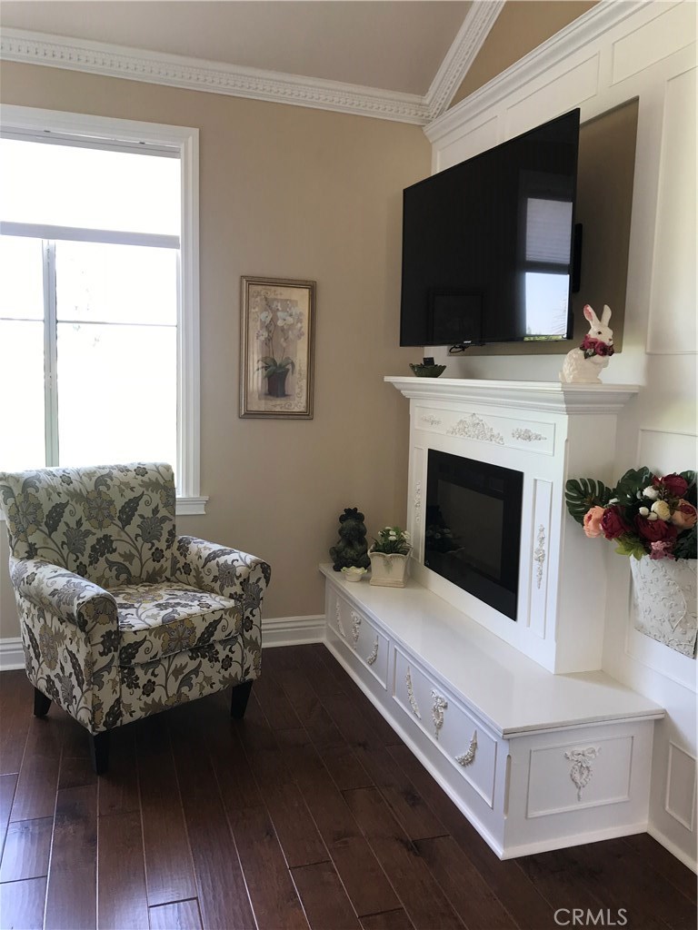 12823 Maxwell Drive Tustin, CA 92782 - Photo 7 of 25 a living room with furniture and a flat screen tv