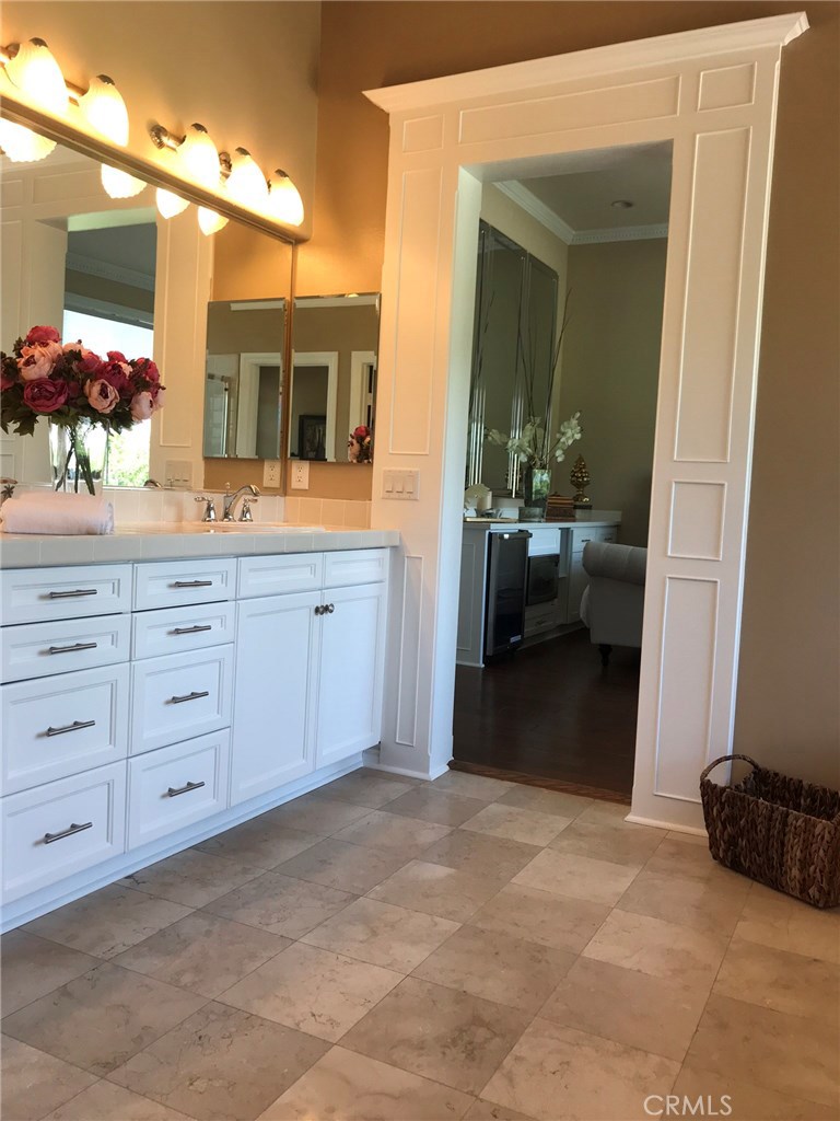 12823 Maxwell Drive Tustin, CA 92782 - Photo 10 of 25 a view of a bathroom and a sink