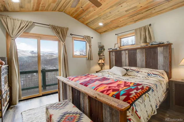 a bathroom with a double vanity sink a mirror and a shower