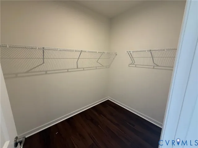 a view of a room with racks on the wall