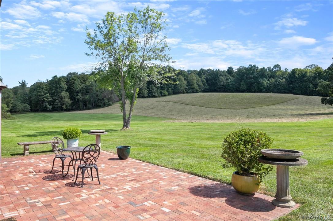 55 Daley Road Poughkeepsie, NY 12603 - Photo 11 of 48 a view of a lake with a table and chairs