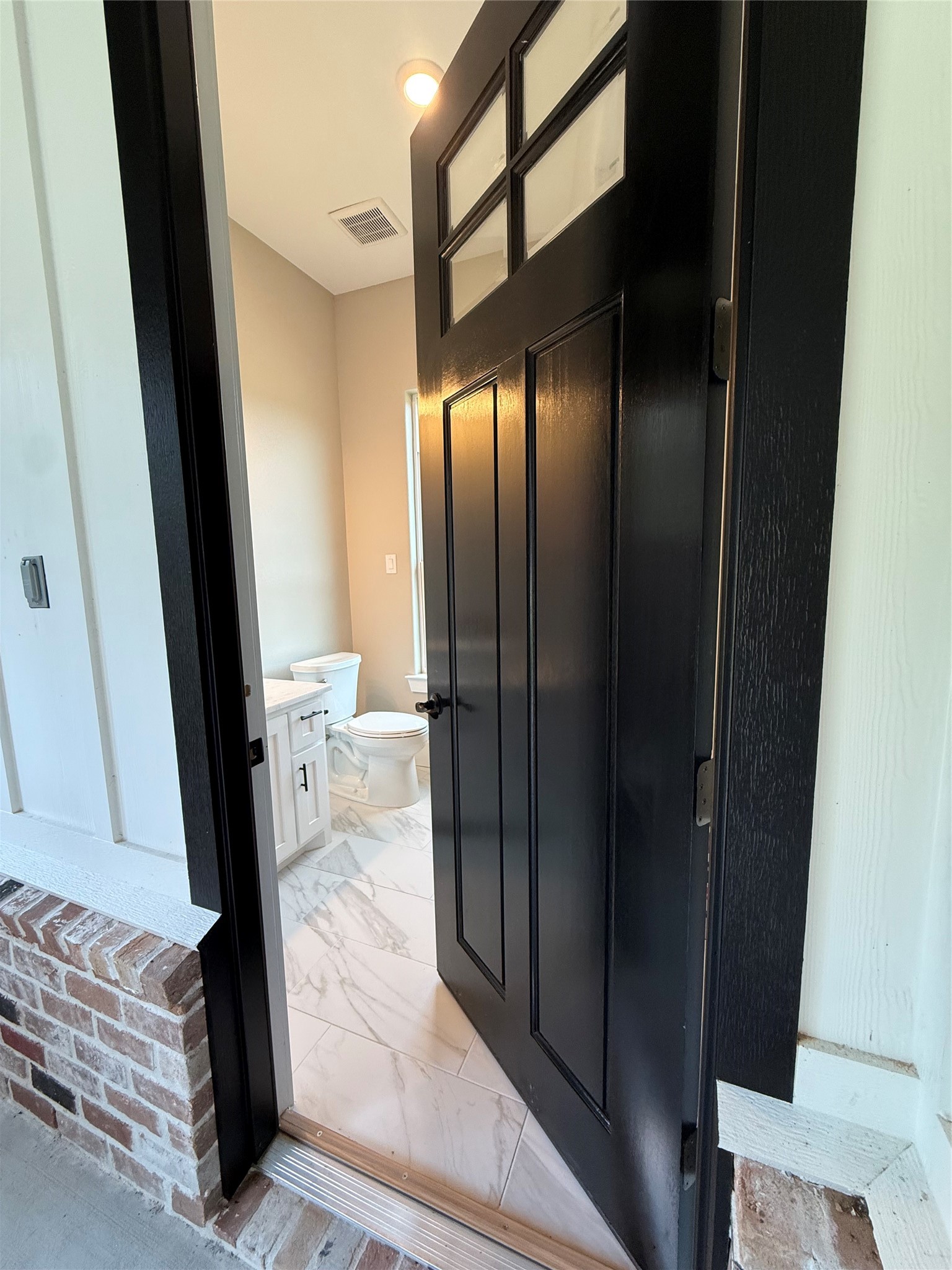 41 Pausel Road Huntsville, TX 77340 - Photo 12 of 41 a view of a bathroom from the hallway
