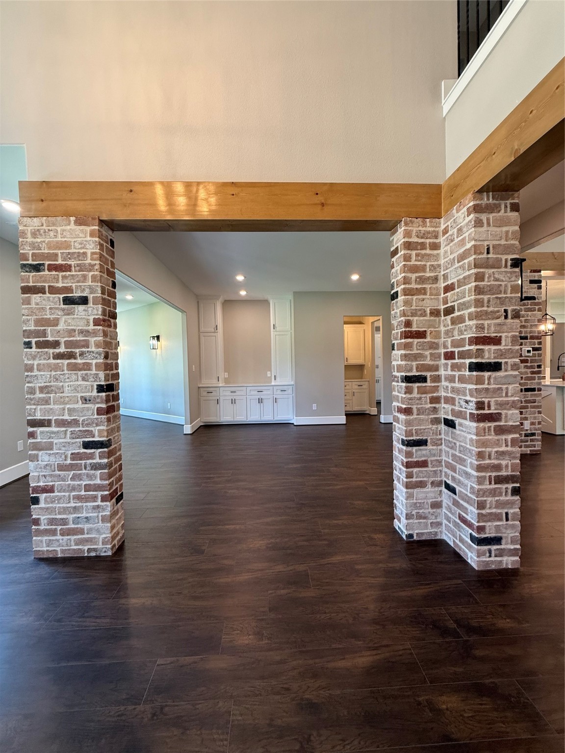 41 Pausel Road Huntsville, TX 77340 - Photo 16 of 41 an empty room with wooden floor and windows