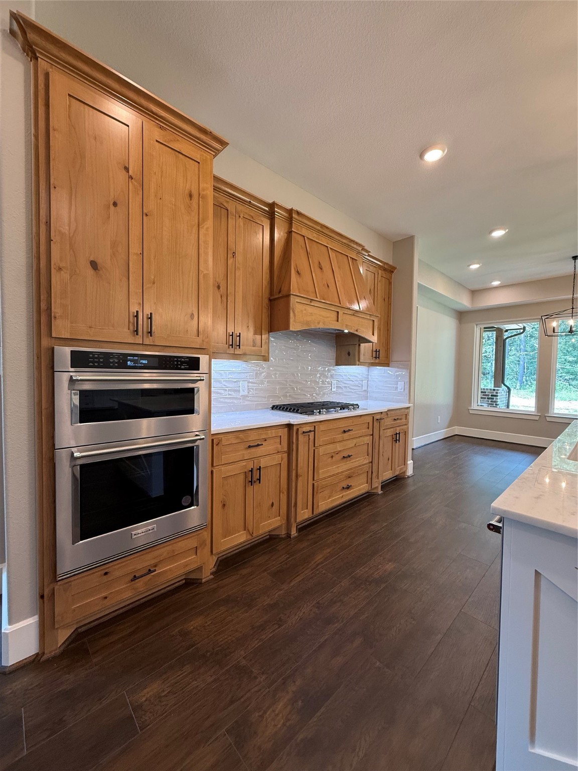 41 Pausel Road Huntsville, TX 77340 - Photo 23 of 41 a kitchen with stainless steel appliances a stove and a refrigerator