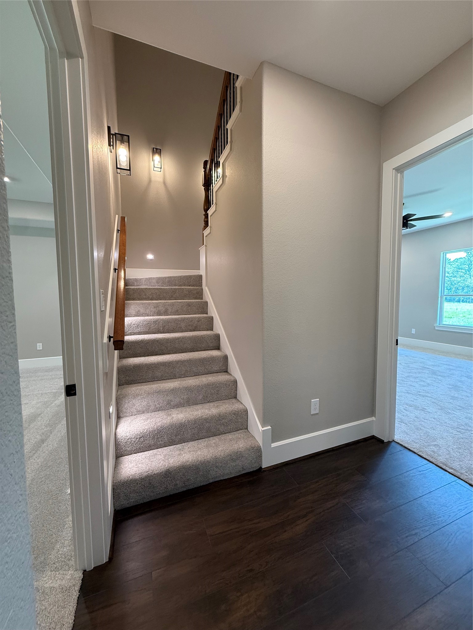 41 Pausel Road Huntsville, TX 77340 - Photo 29 of 41 a view of a livingroom with wooden floor and stairs