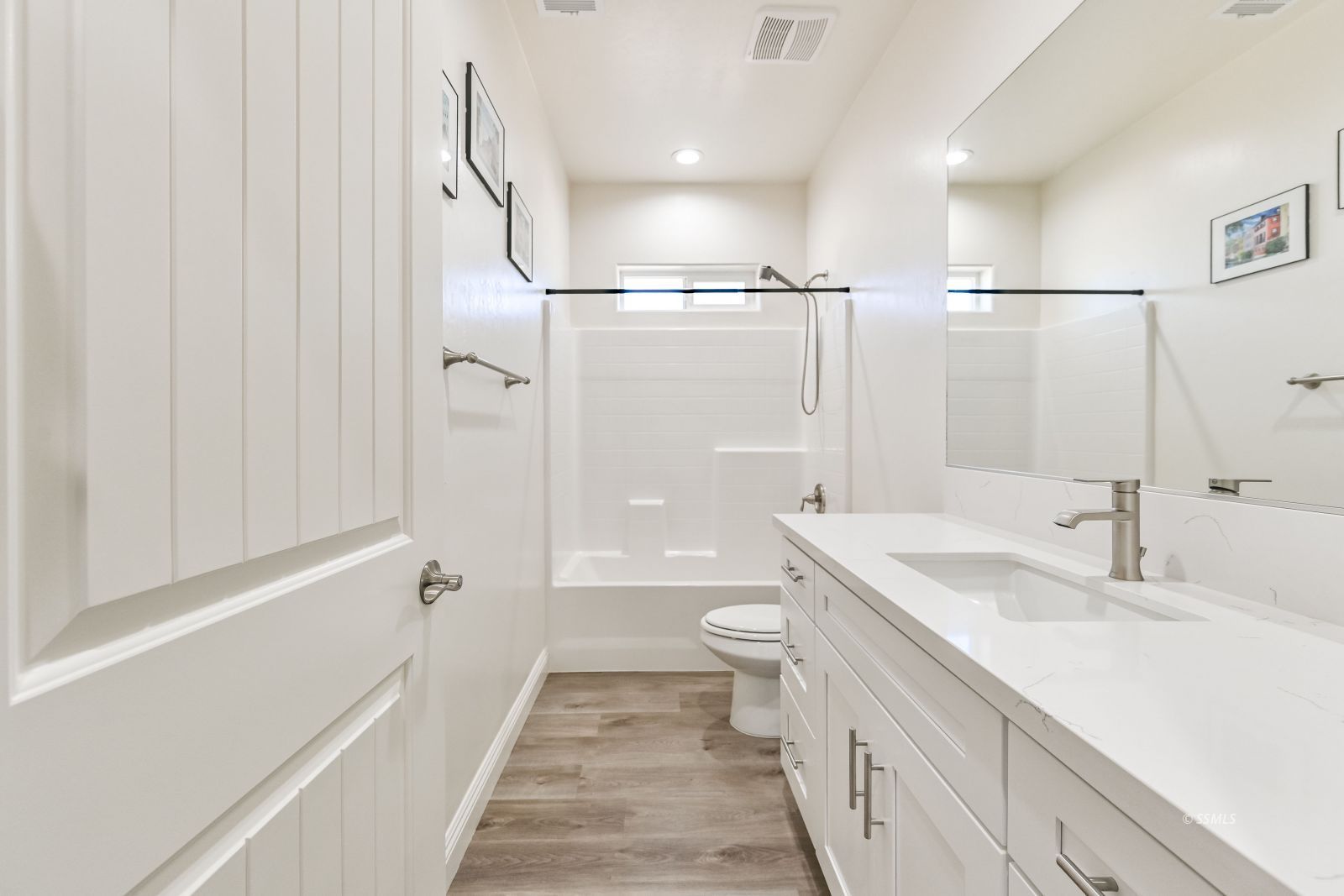 1031 West Church Avenue Ridgecrest, CA 93555 - Photo 35 of 49 a bathroom with a sink a toilet and shower