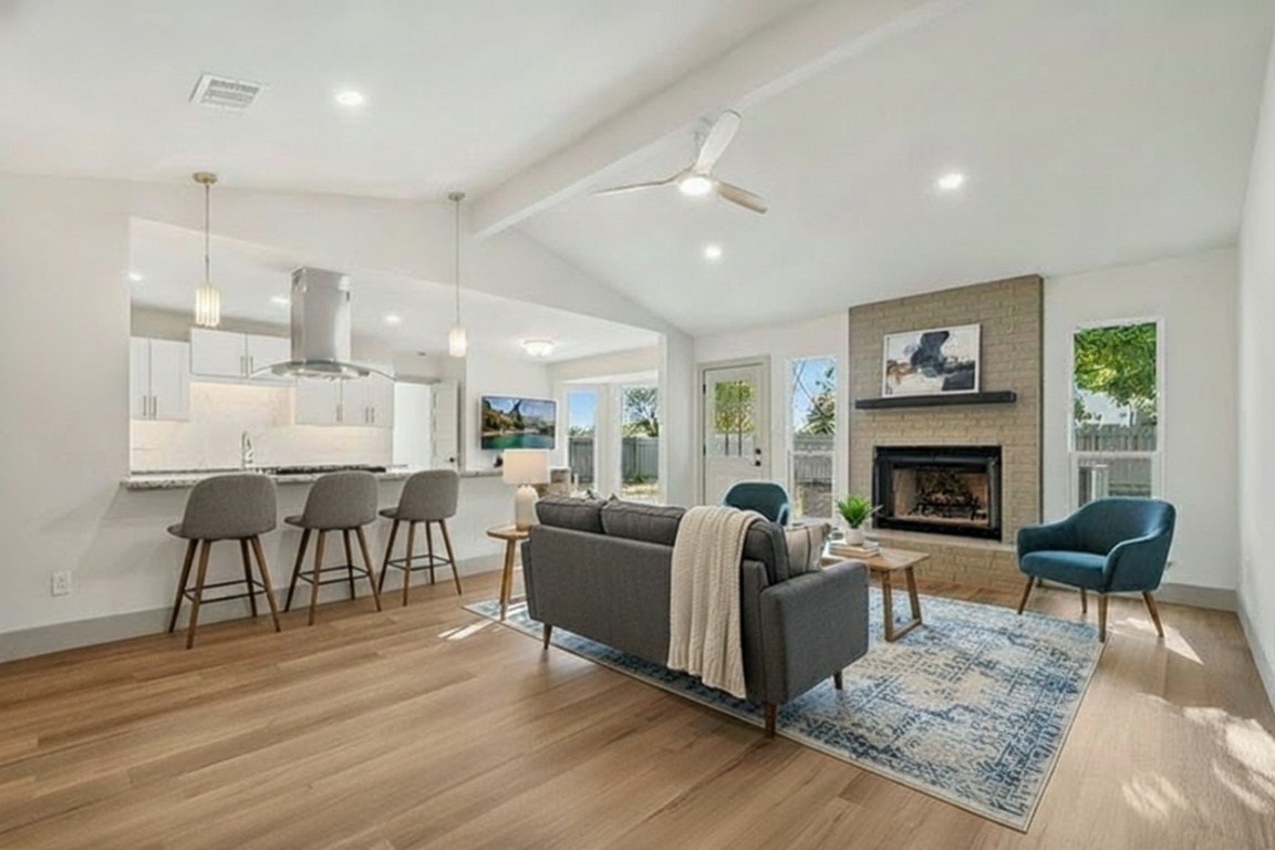 a living room with furniture and a fireplace