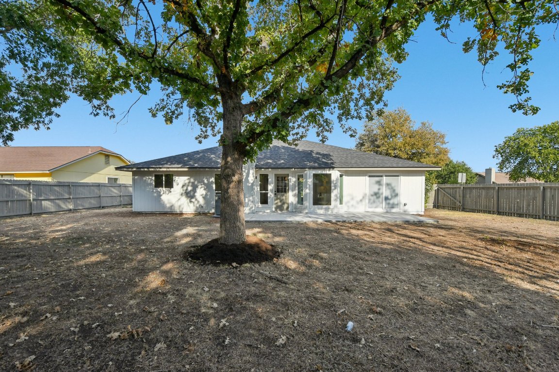417 Oakridge Pass Cedar Park, TX 78613 - Photo 31 of 33 a front view of a house with a yard