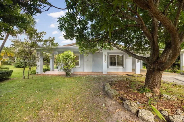 a house view with a garden space