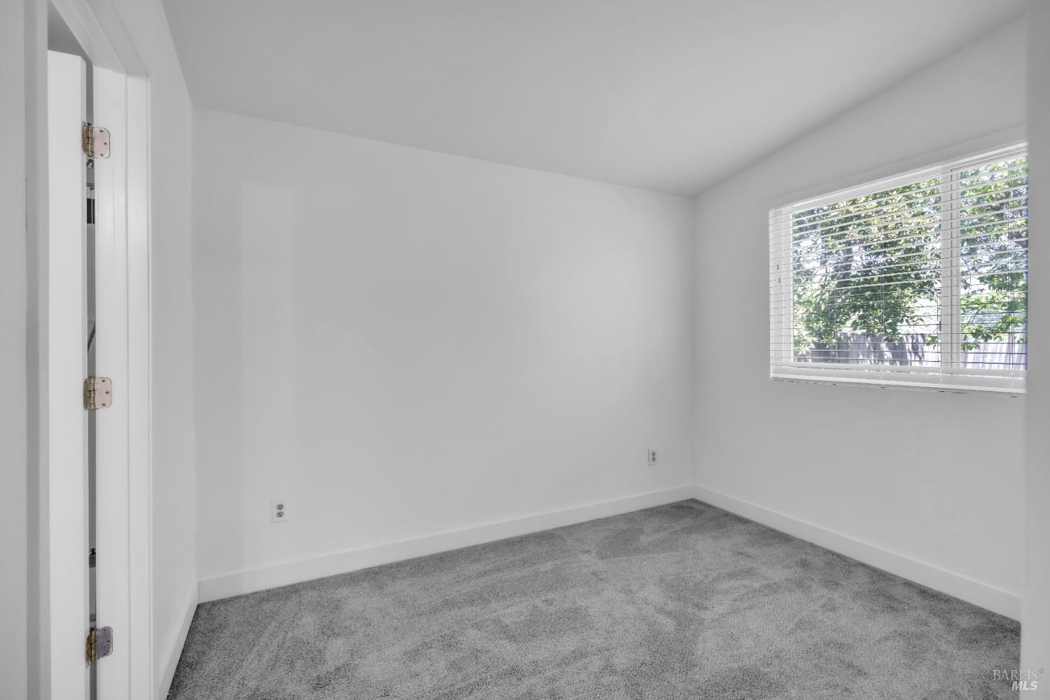 514 Montezuma Street Rio Vista, CA 94571 - Photo 23 of 36 an empty room with a window
