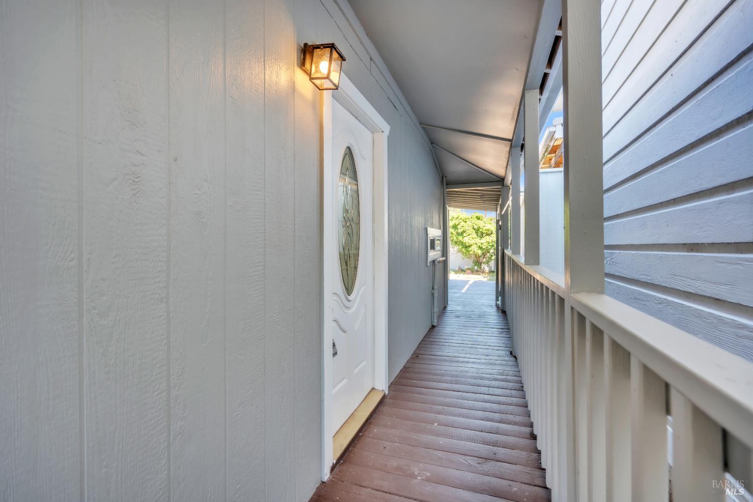 514 Montezuma Street Rio Vista, CA 94571 - Photo 34 of 36 a view of a hallway with wooden floor and staircase