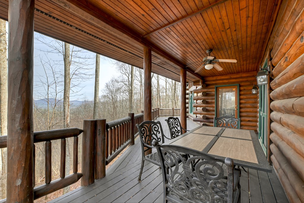 260 Observation Lane Blue Ridge, GA 30513 - Photo 19 of 100 a view of a dining room with furniture window and outside view