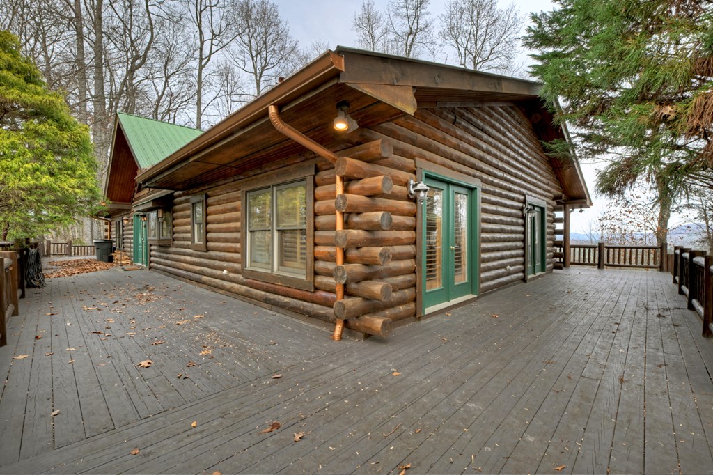 260 Observation Lane Blue Ridge, GA 30513 - Photo 23 of 100 a view of a house with wooden fence