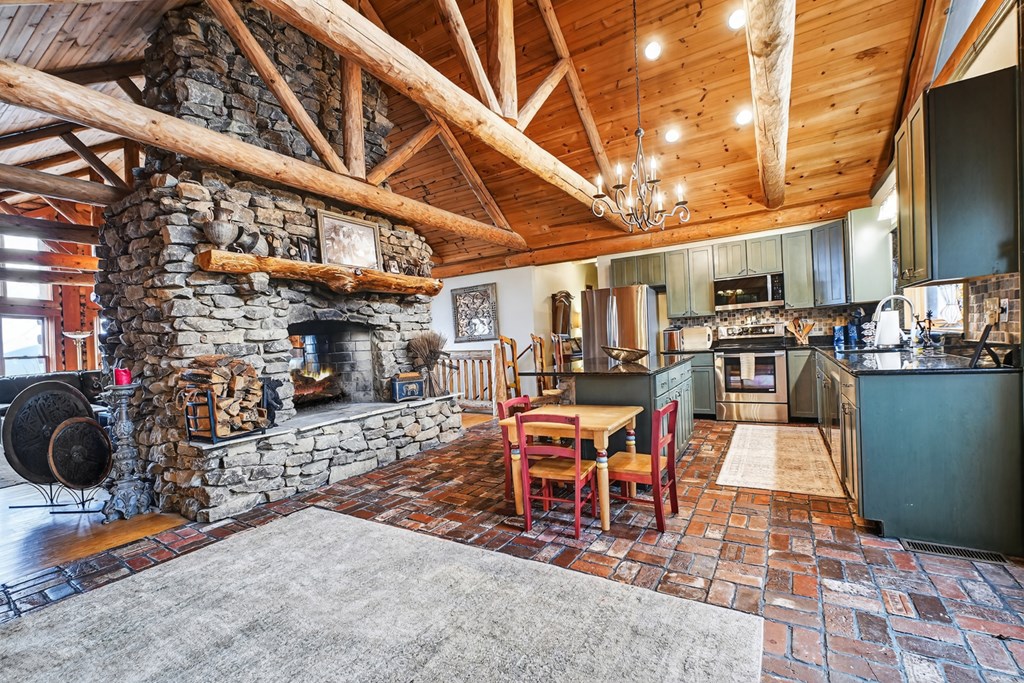260 Observation Lane Blue Ridge, GA 30513 - Photo 30 of 100 a view of a chairs and tables in the patio
