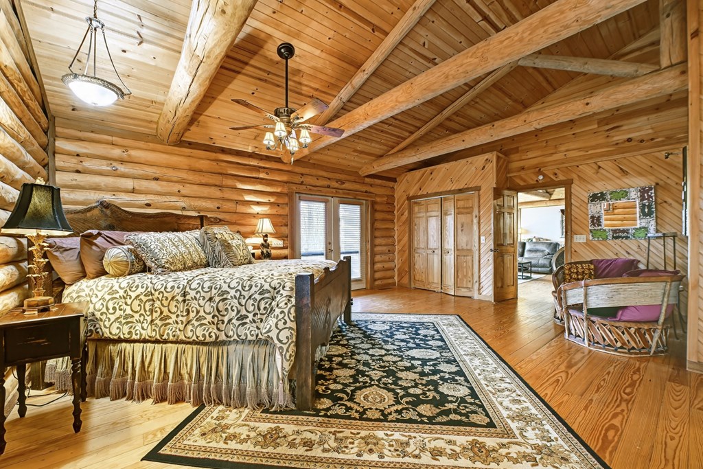 260 Observation Lane Blue Ridge, GA 30513 - Photo 44 of 100 a living room with lots of furniture and a rug