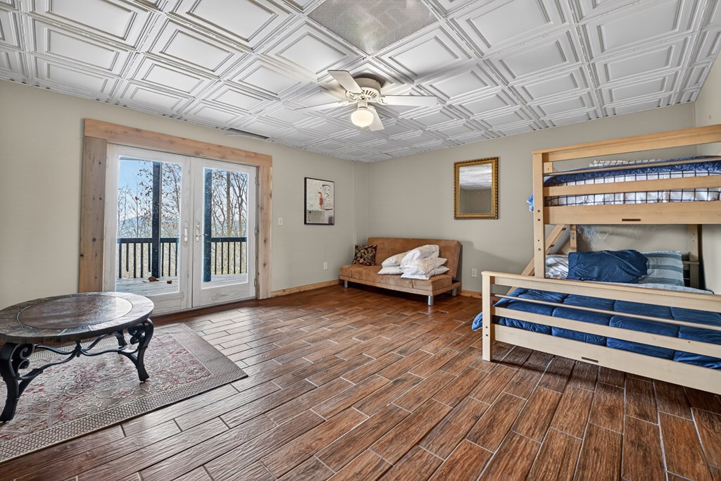 260 Observation Lane Blue Ridge, GA 30513 - Photo 56 of 100 a living room with furniture and a fireplace