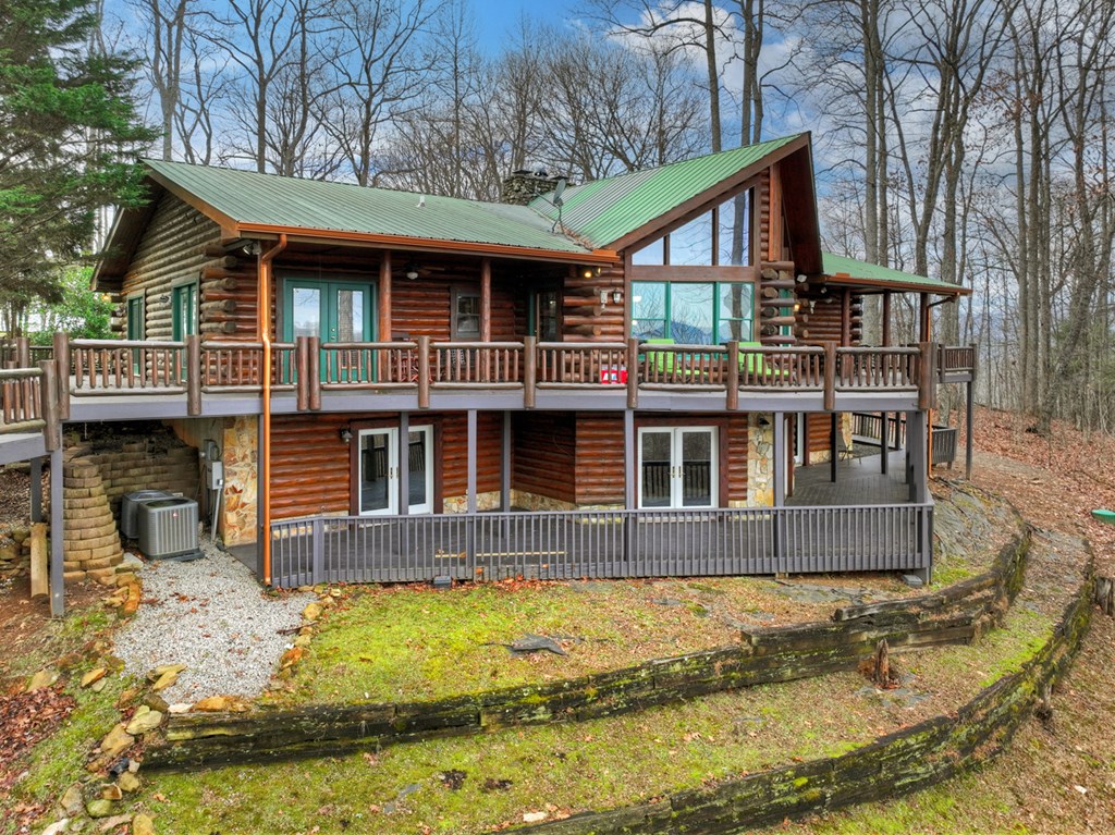260 Observation Lane Blue Ridge, GA 30513 - Photo 98 of 100 a front view of a house with swimming pool