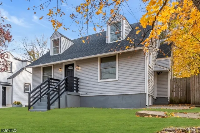 a house view with a garden space