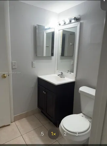 a stove top oven sitting inside of a kitchen