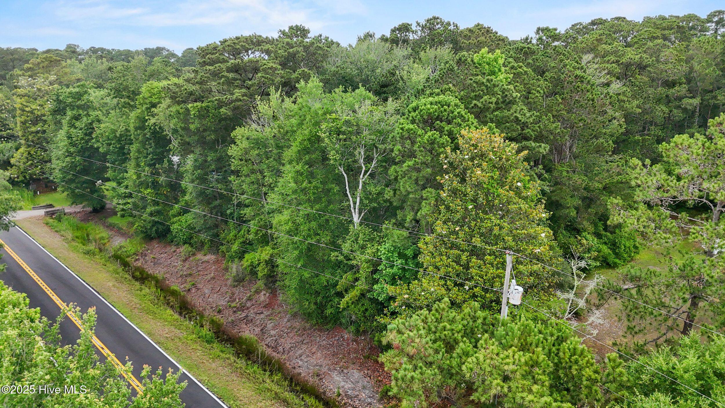 833 North Seabreeze Road Wilmington, NC 28409 - Photo 5 of 7 833 Seabreeze Lot Side
