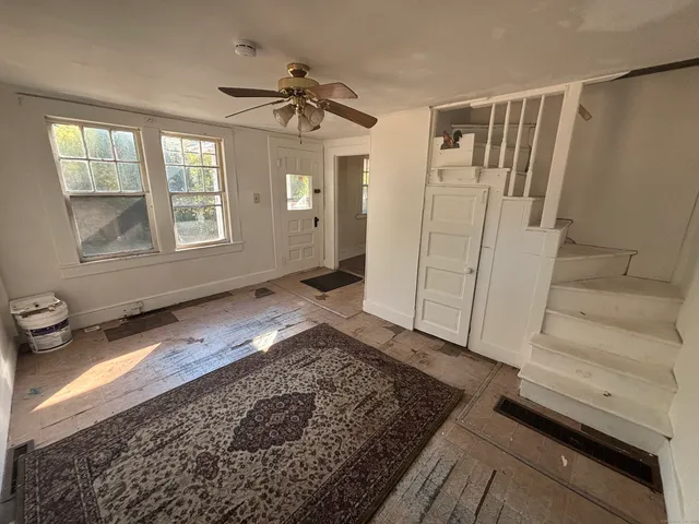 wooden floor with window in an empty room