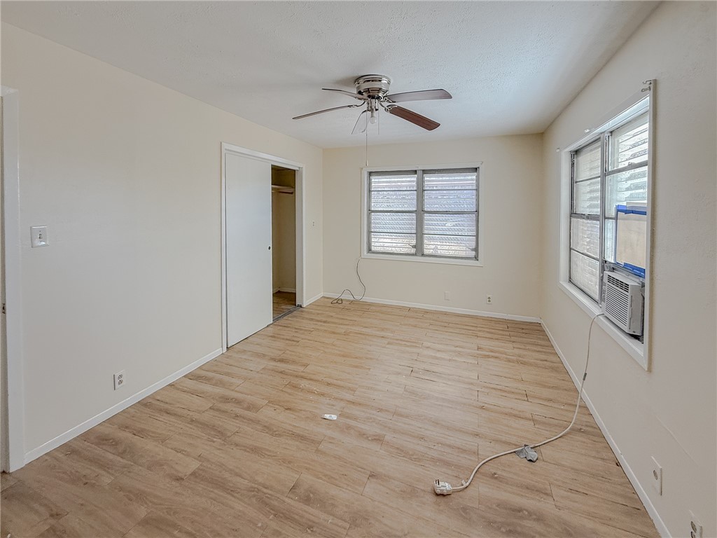 833 Booty Street Sinton, TX 78387 - Photo 5 of 9 a view of an empty room with a window