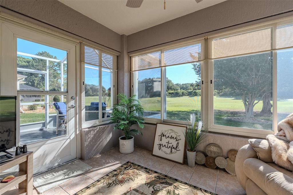 15143 Southwest 14th Avenue Road Ocala, FL 34473 - Photo 16 of 53 a living room with furniture and windows