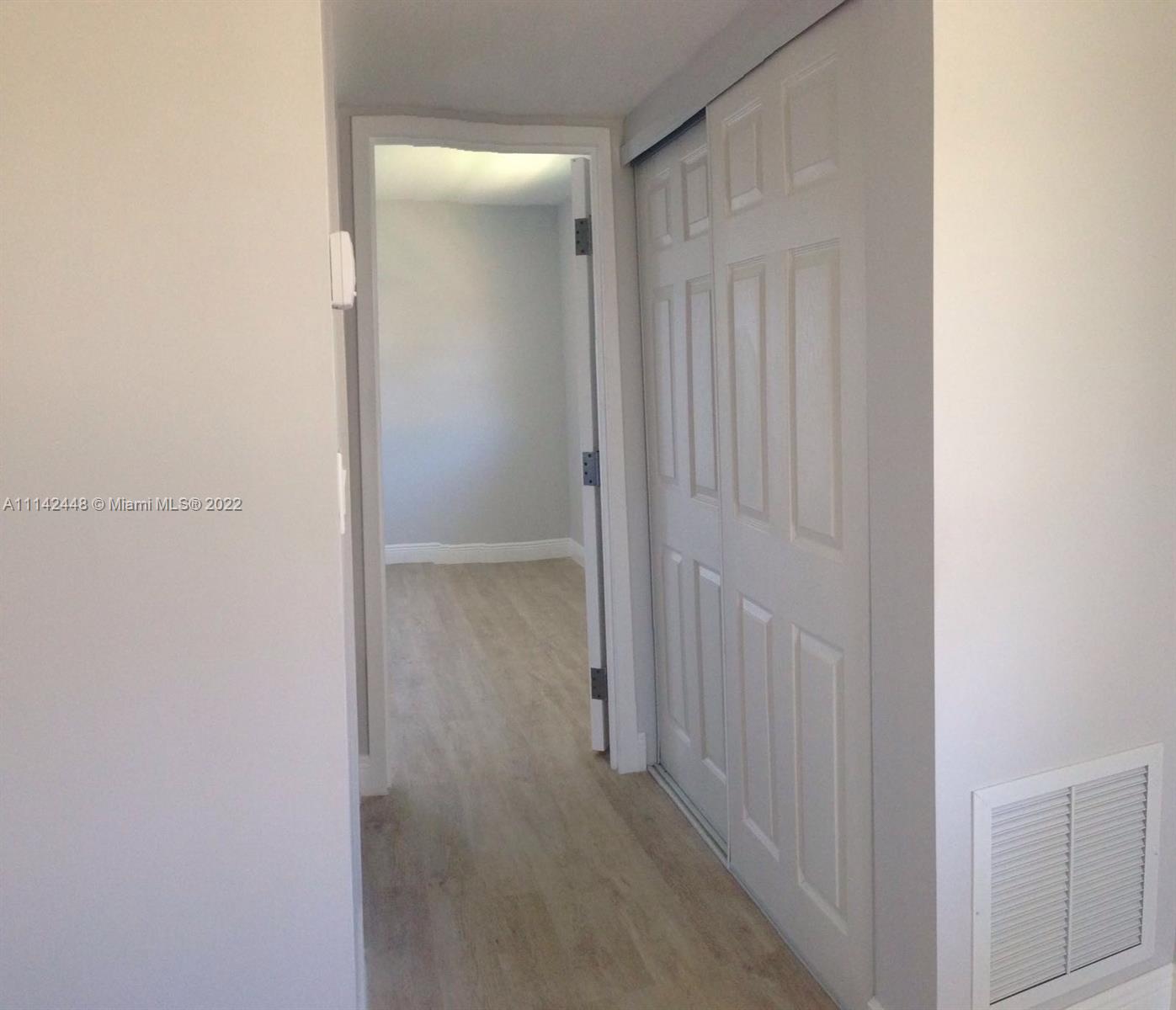 218 Brittany F, Unit E Delray Beach, FL 33446 - Photo 6 of 21 a view of a hallway