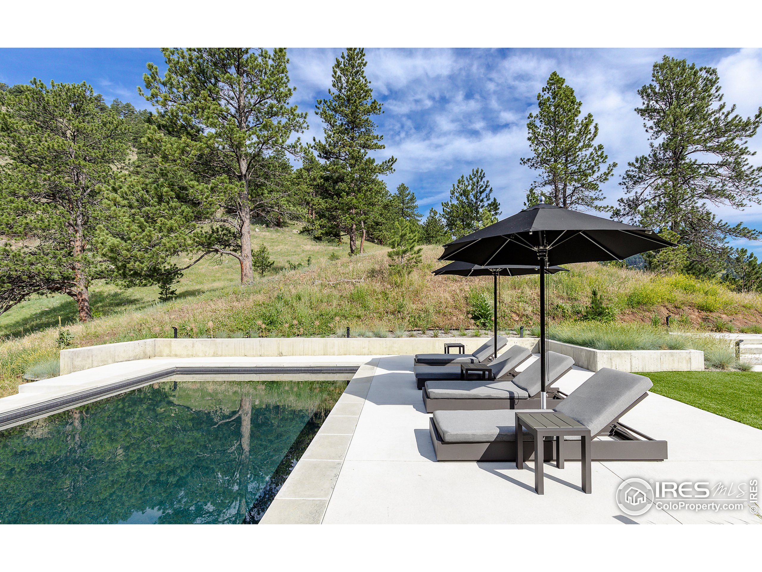 Undisclosed Address Boulder, CO 80302 - Photo 11 of 40 a view of a backyard with sitting area
