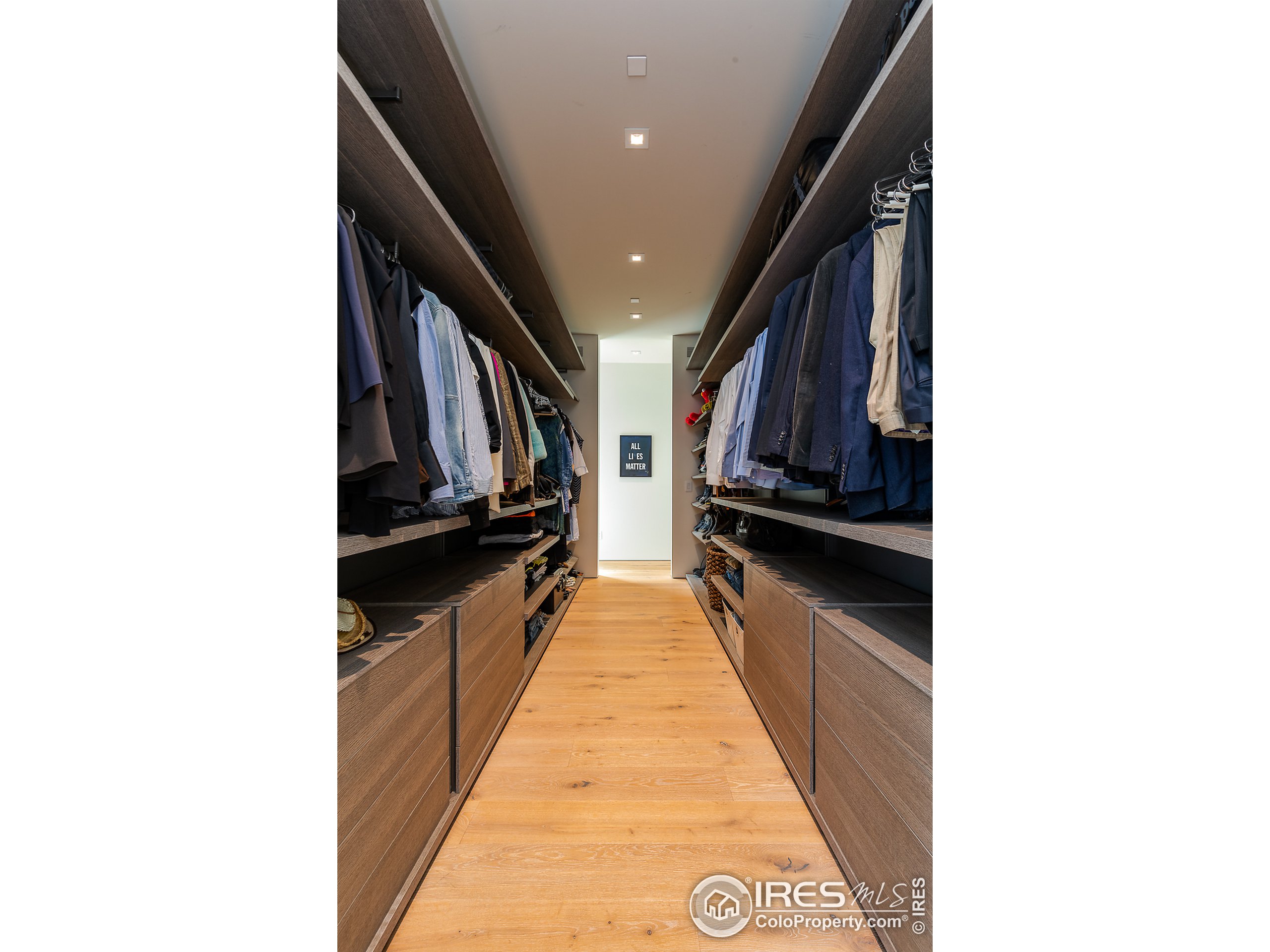 Undisclosed Address Boulder, CO 80302 - Photo 31 of 40 a hallway with couches and kitchen view