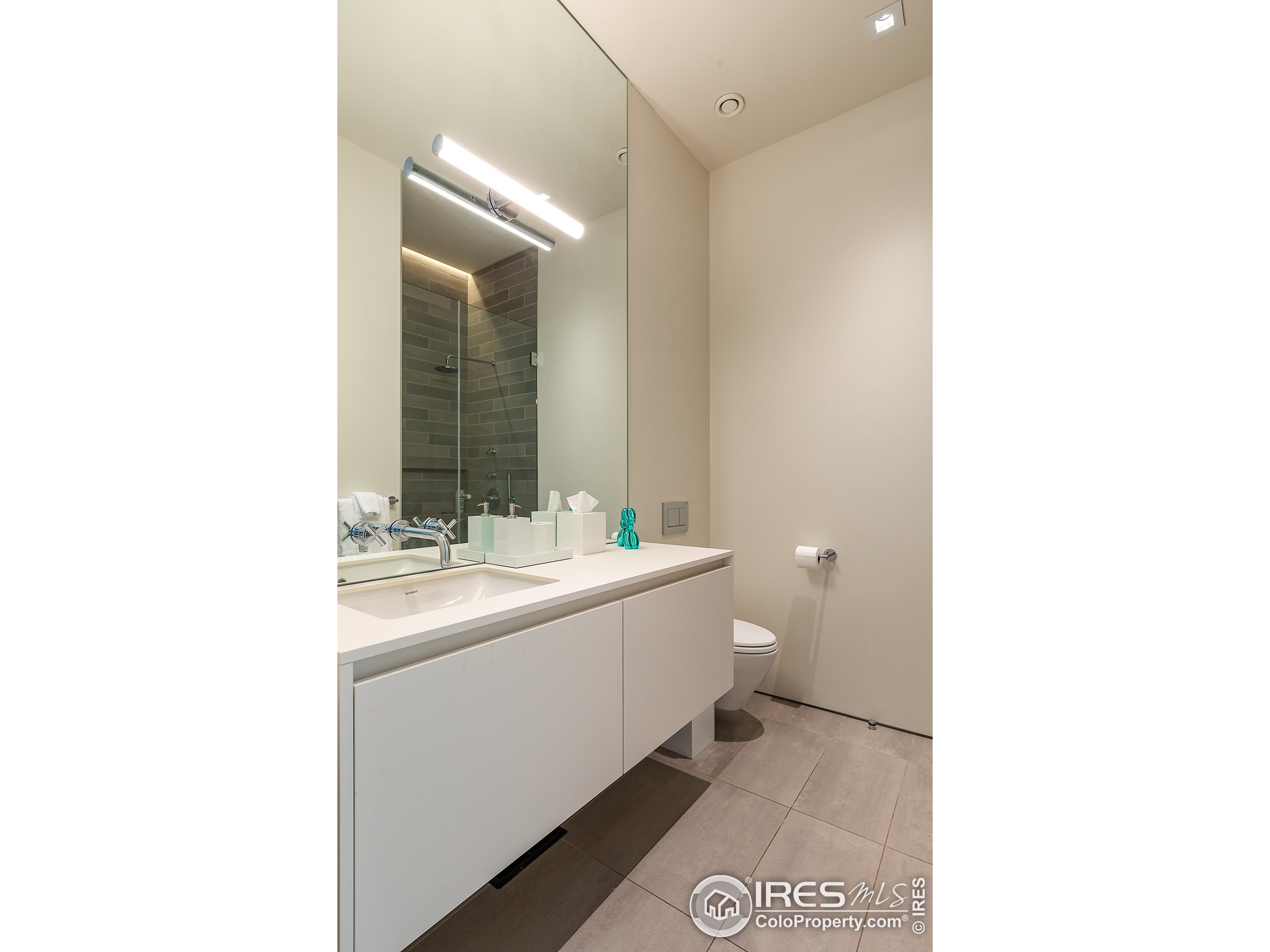 Undisclosed Address Boulder, CO 80302 - Photo 36 of 40 a bathroom with a sink and a mirror