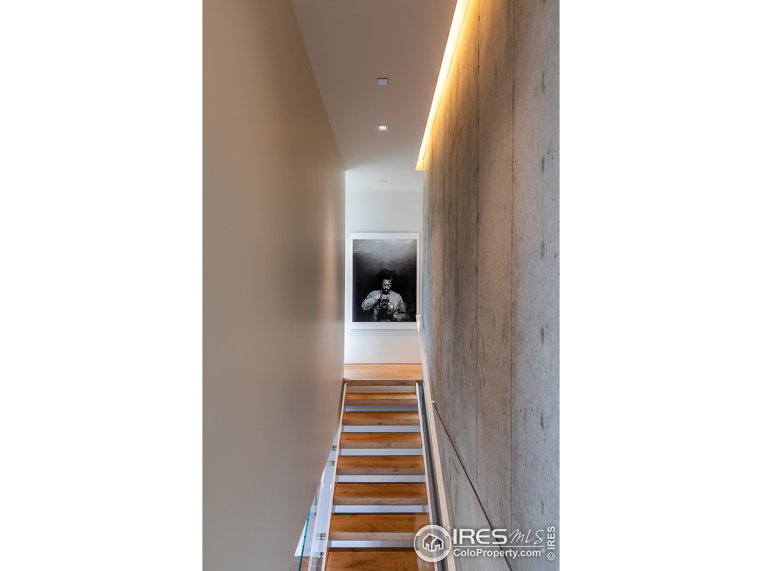 Undisclosed Address Boulder, CO 80302 - Photo 37 of 40 a view of a hallway with wooden floor