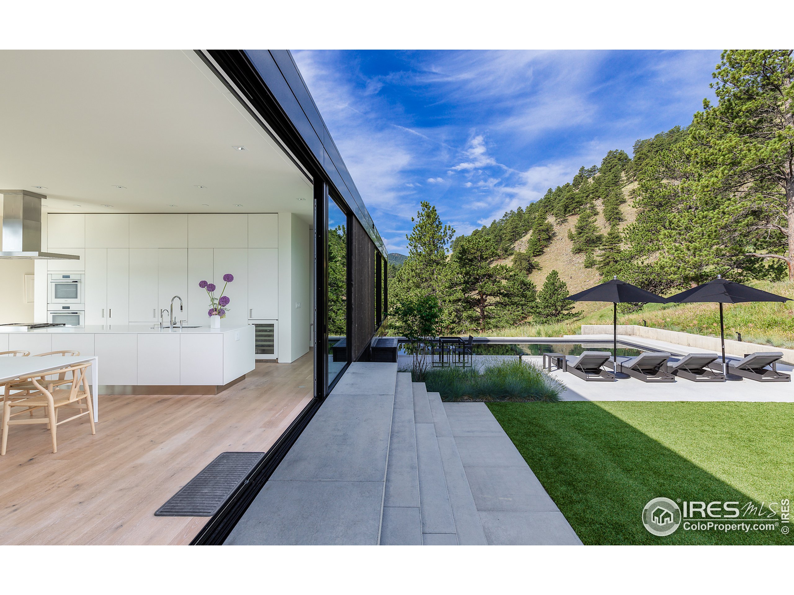 Undisclosed Address Boulder, CO 80302 - Photo 4 of 40 a view of house with backyard porch and patio