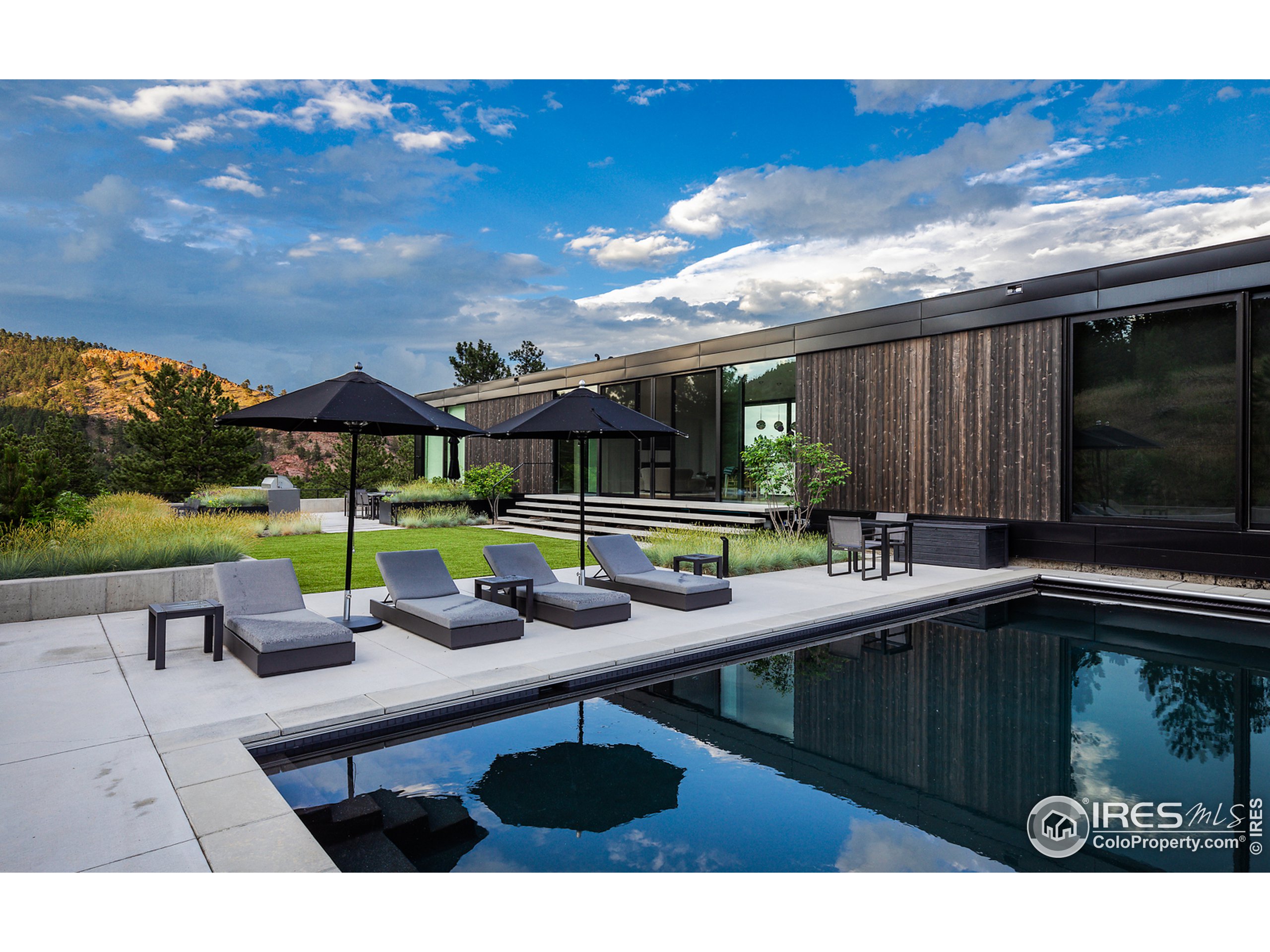 Undisclosed Address Boulder, CO 80302 - Photo 9 of 40 a view of a backyard with sitting area