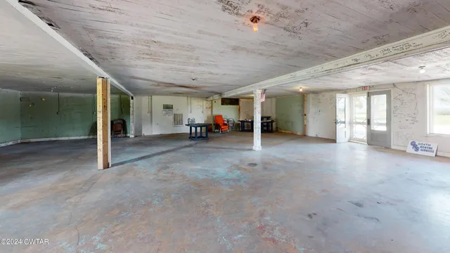 a view of a livingroom with staircase