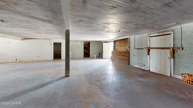 a view of a livingroom with a staircase