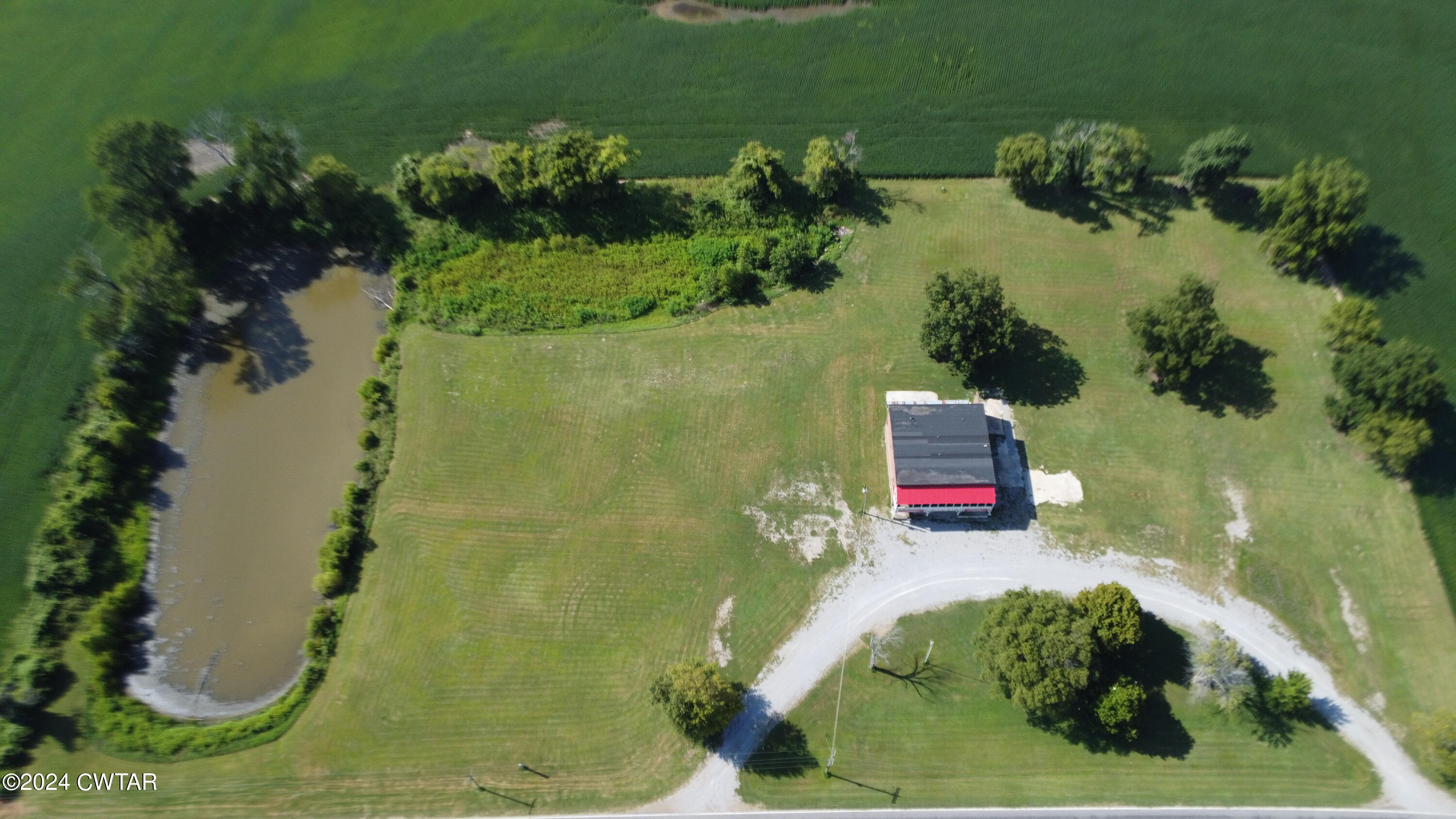 13529 Highway 19 W Ripley Tn 38063 West Ripley, TN 38063 - Photo 17 of 26 an aerial view of a house with a yard