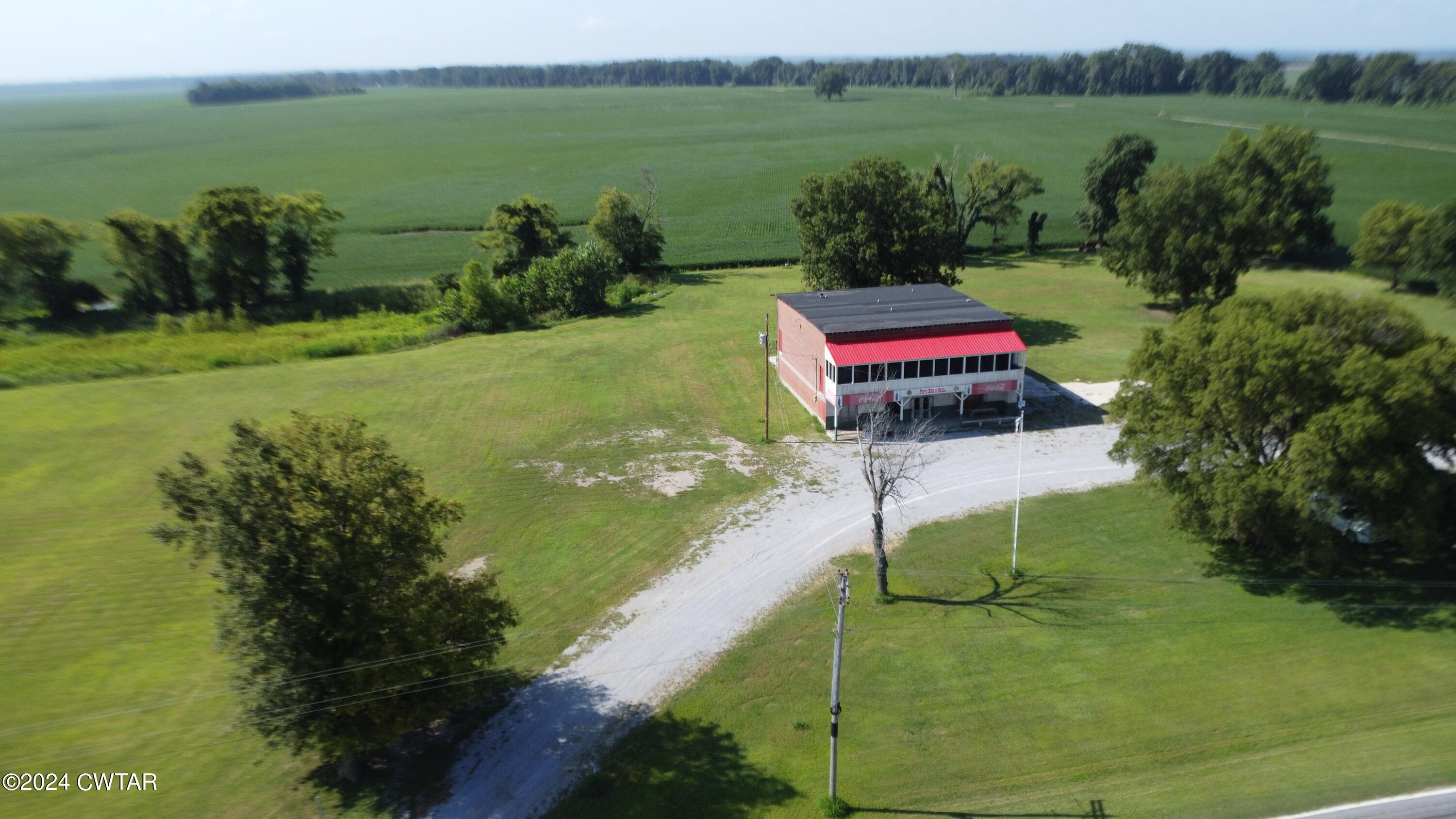 13529 Highway 19 W Ripley Tn 38063 West Ripley, TN 38063 - Photo 3 of 26 a view of a lake with a yard