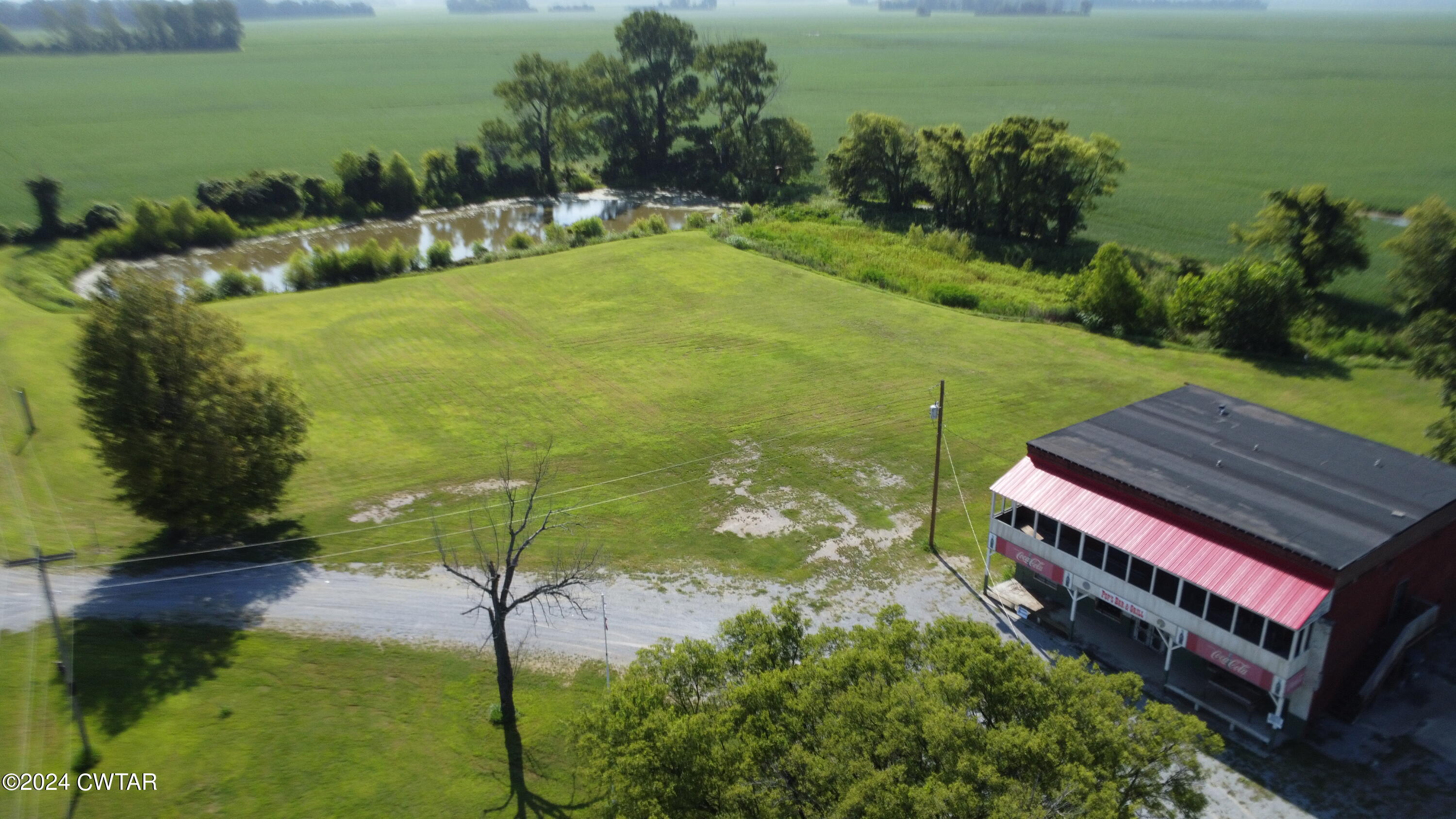 13529 Highway 19 W Ripley Tn 38063 West Ripley, TN 38063 - Photo 4 of 26 a view of a garden with lawn chairs
